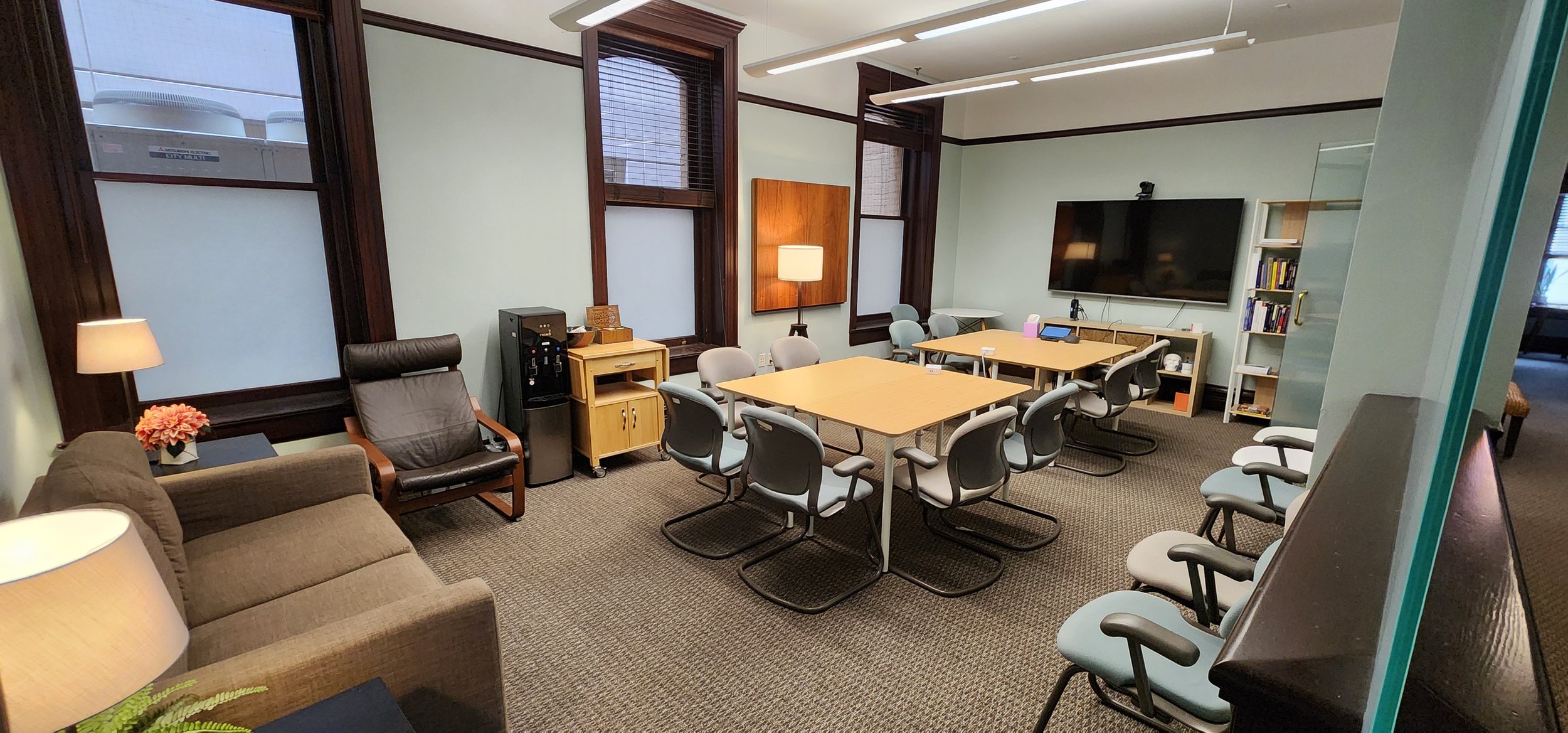Community room arranged for a group session or workshop