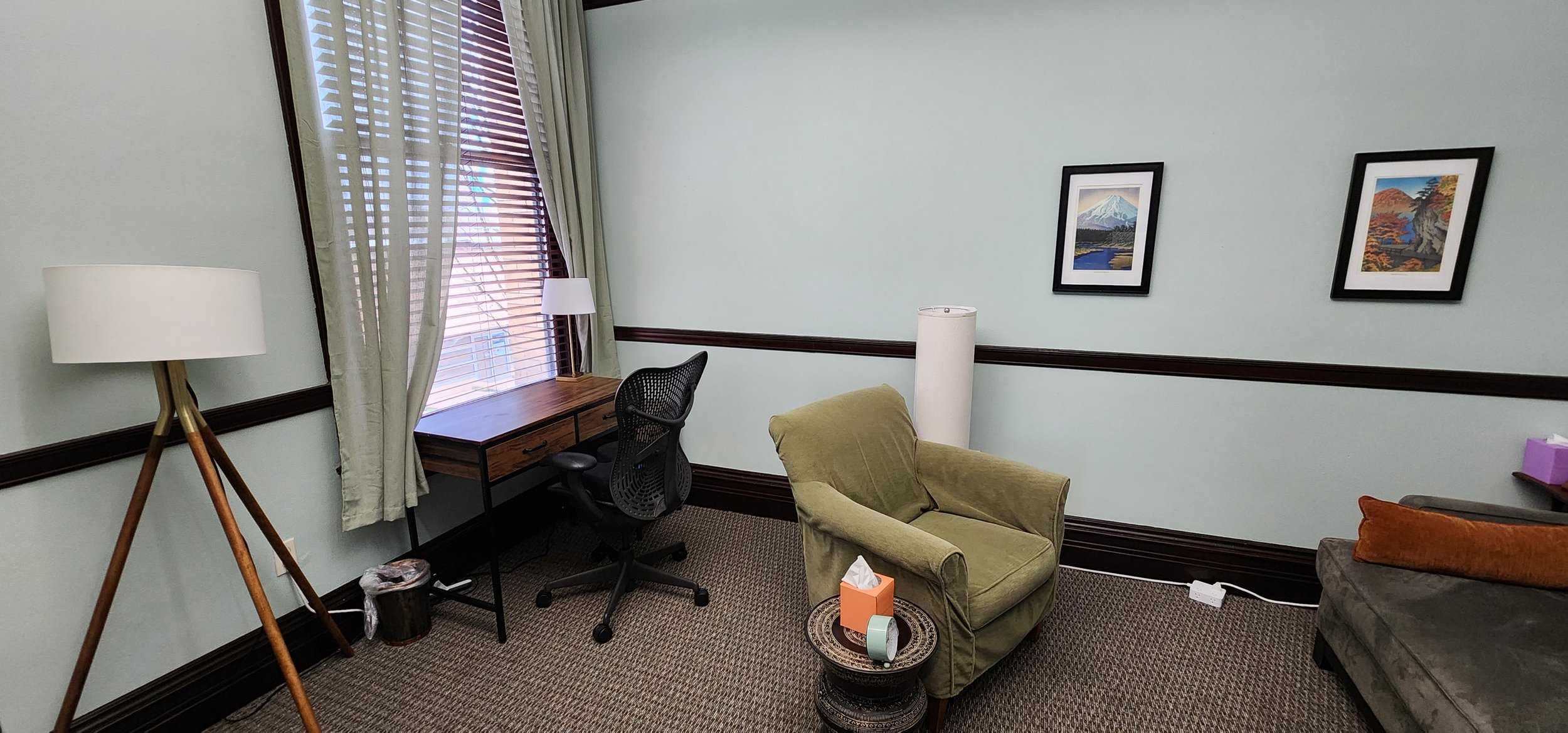 Office detail with chair, desk, and window